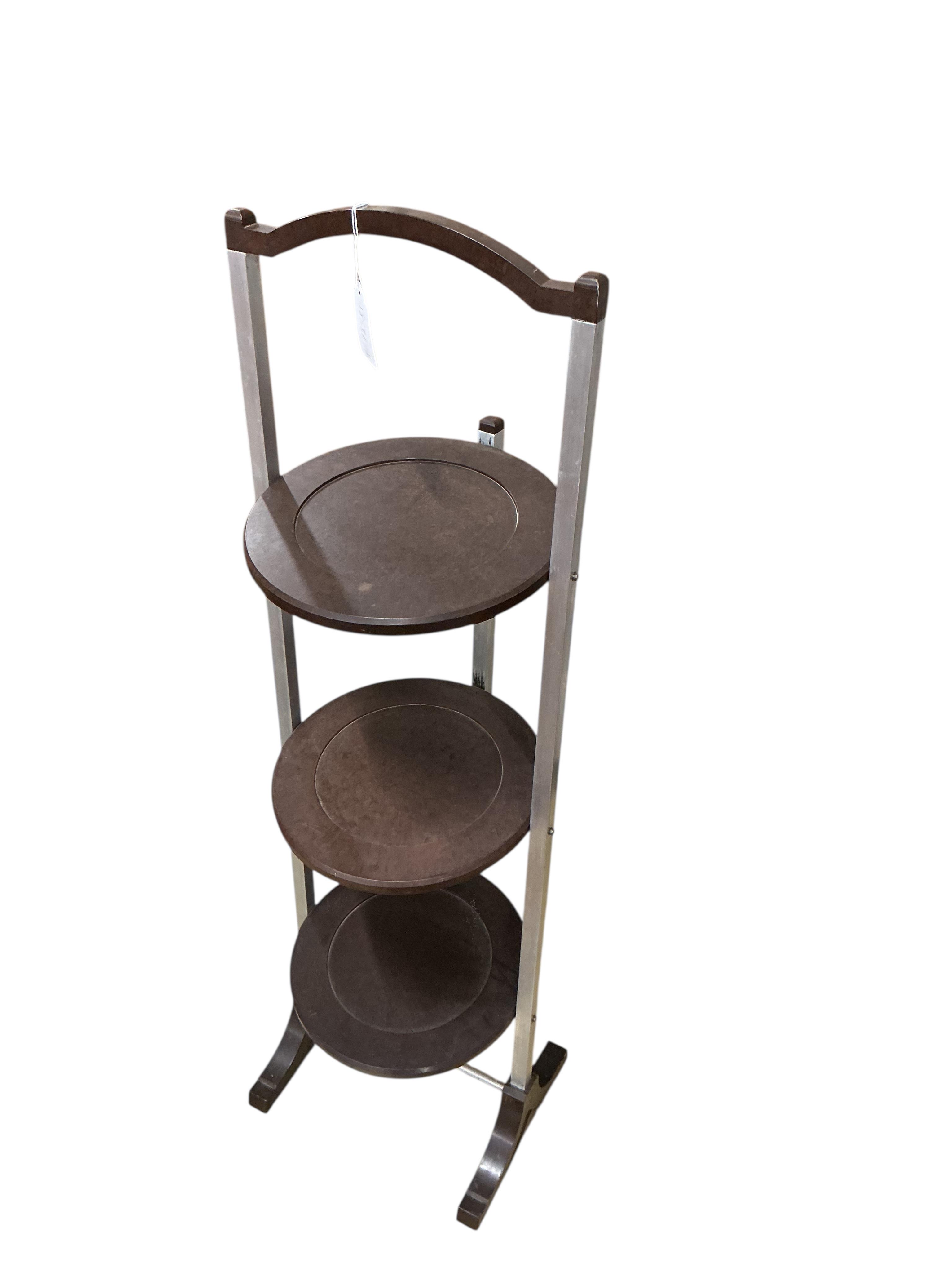 A Bakelite cake stand, width 29cm, depth 27cm, height 94cm